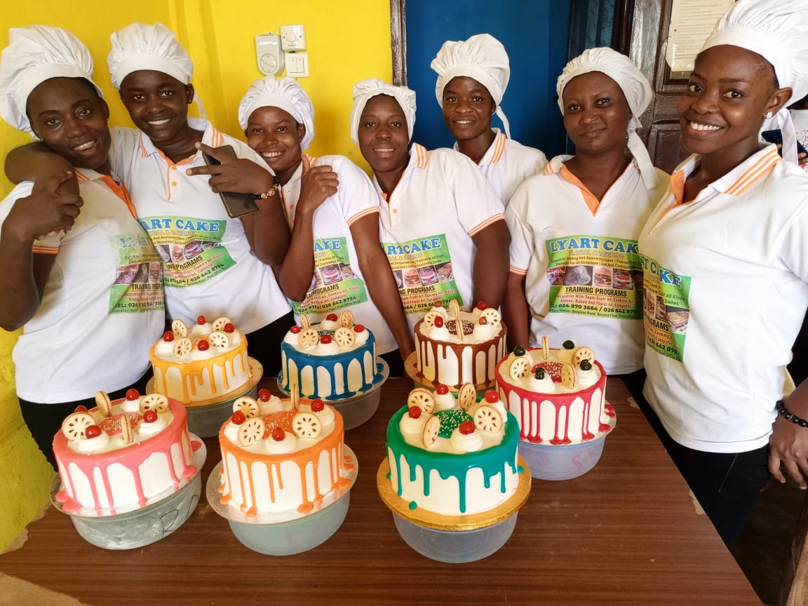 students with their cakes