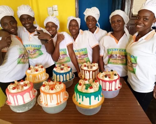 students with their cakes